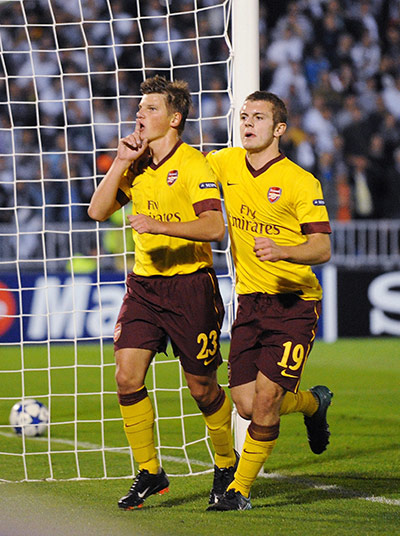 Champions League: Andre Arshavin celebrates after scoring against Partizan Belgrade