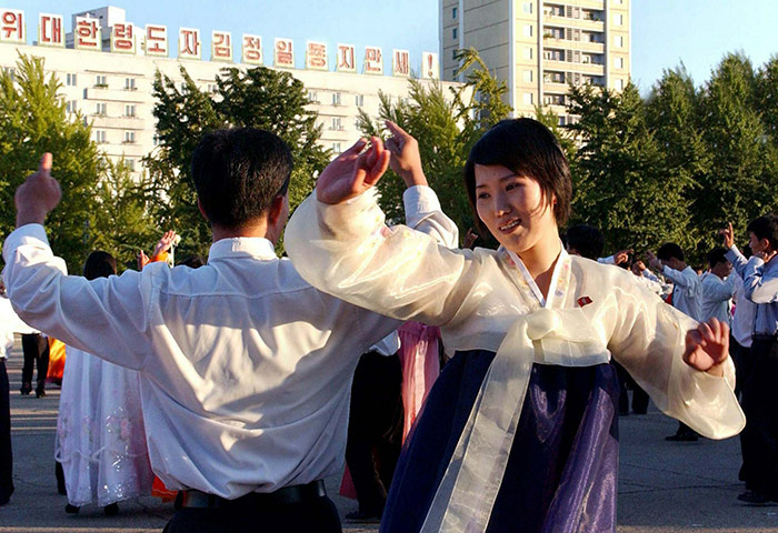 North Korea conference: Young North Koreans dance in Pyongyang for Kim Jong-Un's promotion