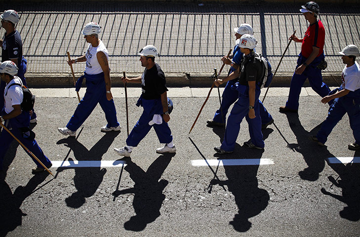 24hours Wed: Miners walk in Spain, on their 8th day of a 200-kilometer march 