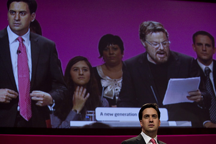 Labour party conference: Party leader Ed Miliband listens to actor Eddie Izzard during a Q&A session