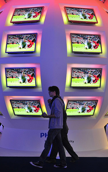 IFA Berlin: Visitors walk past a display of flat screen TV's at the IFA in Berlin
