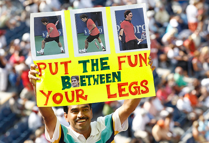tennis: A tennis fan displays a sign