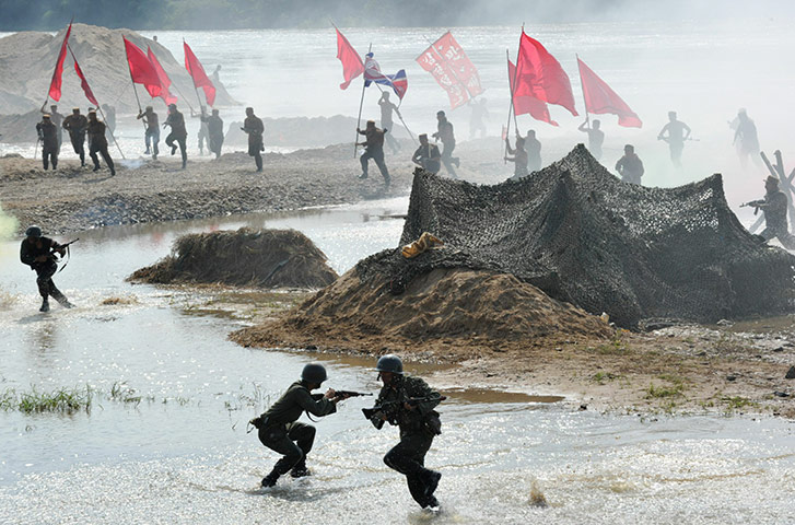 24 Hours: South Korean soldiers during a re-enactment of the battle of Nakdong River
