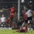 Champs League Wed: Ledley King blocks a header from Bryan Ruiz