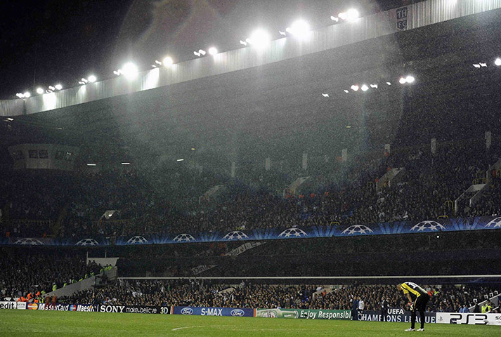Champs League Wed: FC Twente's Mihaylov stands in the rain after Spurs scored their fourth 