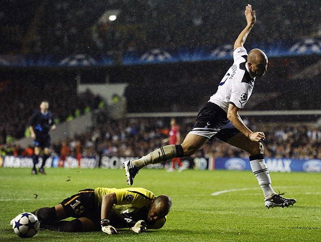 Champs League Wed: Alan Hunt leaps over the Twente keeper Nikolay Mihaylov