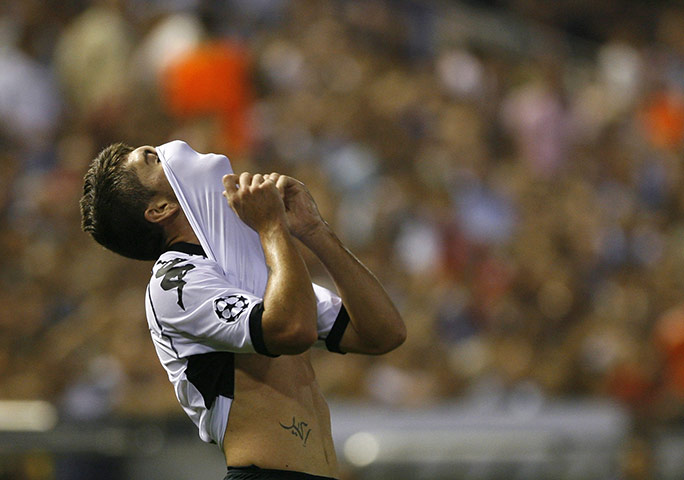 Champs League Wed: Valencia's Pablo reacts during the Champions League game v Manchester Utd