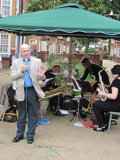 Liverpool Road: A man speaks to public through microphone