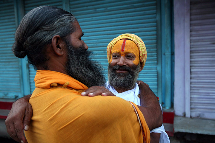 Ayodhya Update: Sadhus or Hindu holymen hug each other to celebrate in Ayodhya