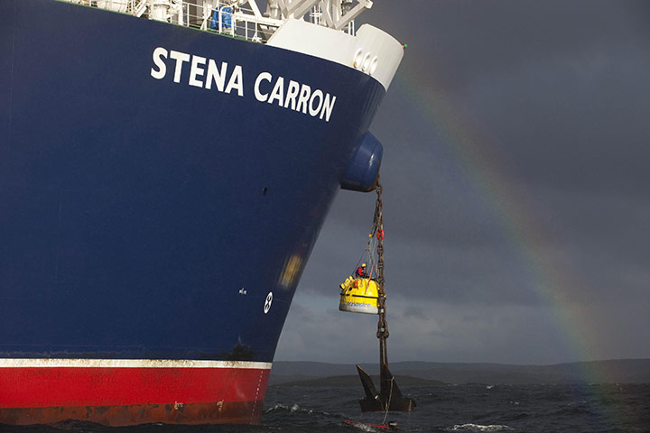 Week in Business: Greenpeace camapigners on an oil ship off the coast of the Shetland Islands
