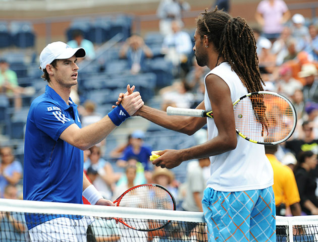 US Open Day 5: Andy Murray (L) of Britain shakes hands