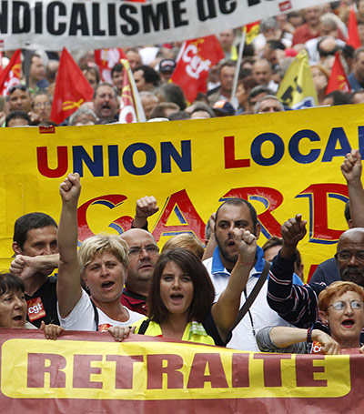 French Strikes: Private and public sector workers demonstrate over pension reforms 