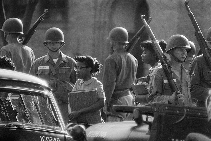 Little Rock: Troops Watch as Black Students go to School