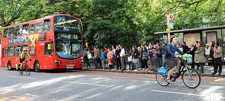 Tube stirke: Cyclist passing a bus queue in Clerkenwell