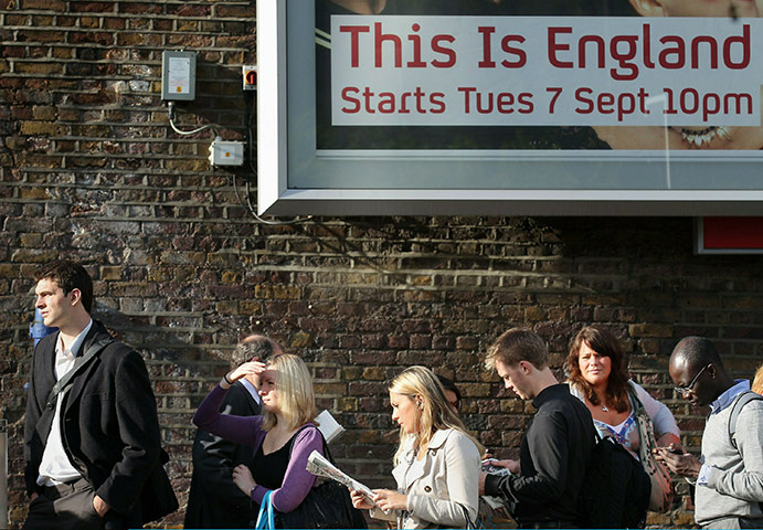 Tube stirke: Passengers wait for a bus near Waterloo Station