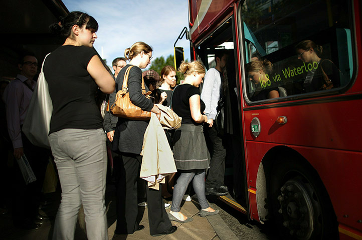 Tube stirke: Passengers line up to get on a bus near Waterloo 