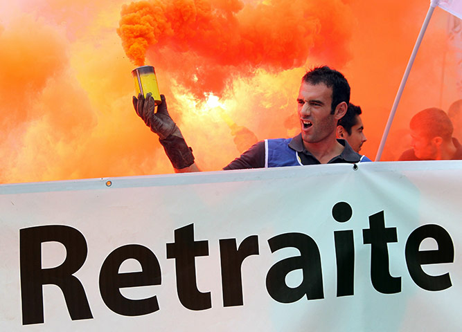 French Strike Update: A fireman takes part in a demonstration