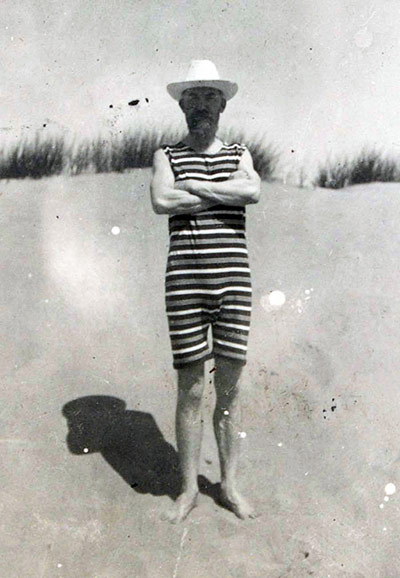 George Bernard Shaw: Shaw standing, arms crossed, on a beach