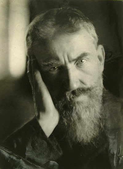 George Bernard Shaw: Self-portrait of Shaw looking straight at the camera