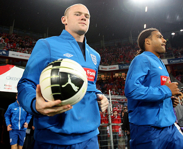 Switzerland v England: Wayne Rooney and Glen Johnson come onto the pitch to warm up