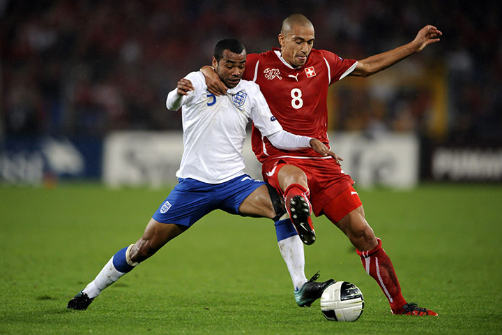 Switzerland v England: England's defender Ashley Cole vies with Goekhan Inler 