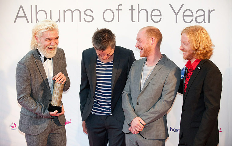 Mercury Prize 2010: Scottish rock group, Biffy Clyro, stand with a trophy 
