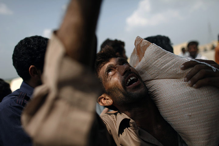 24 hours in pictures: Flood victims in relief camp in Punjab province, PAkistan