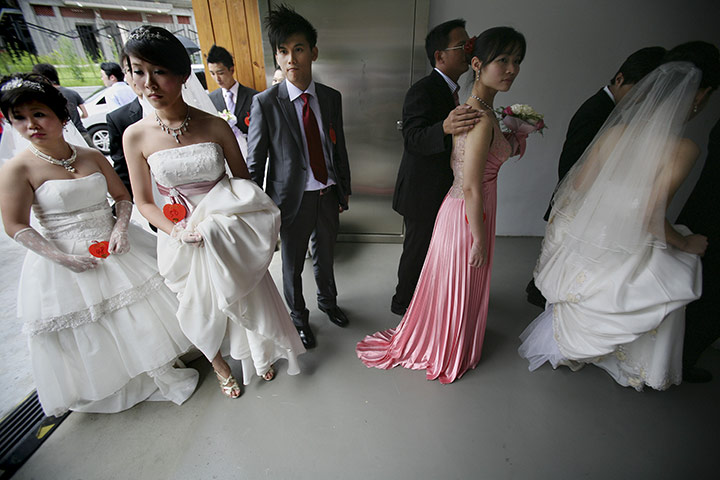 Mass Wedding Taipei: Couples line up before a mass wedding in Taipei, Taiwan