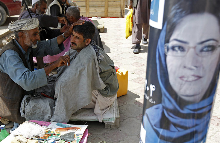 Eid Al-Fitr Festival: Afghan man gets moustache trimmed by barber ahead of Eid-al-Fitr in Kabul