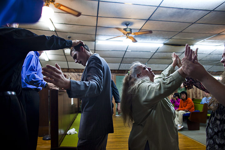 24 hours in pics: Church of the Lord Jesus members, West Virginia, USA