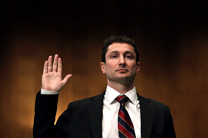 Week in Business: Fabrice Tourre is sworn in while testifying in April.