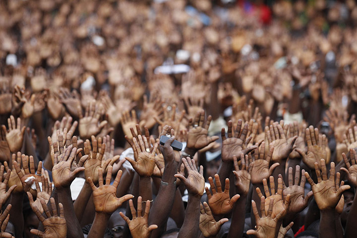24 hours in pictures: Abidjan, Ivory Coast: Supporters of incumbent president Laurent Gbagbo