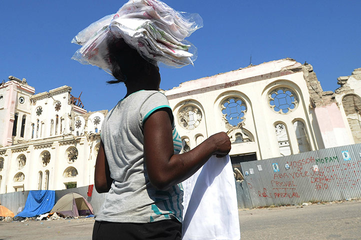 Haiti then and now: January 2011: A woman walks past the same church 
