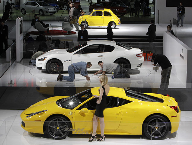Detroit Motor Show: A model poses with the Ferrari 458 Italia