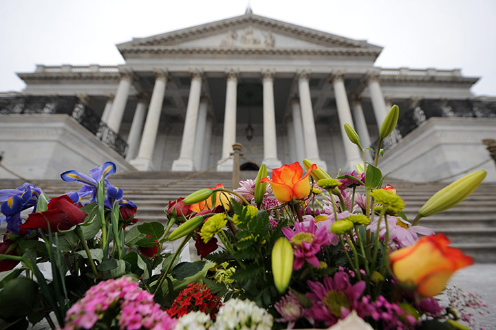 Tuscon shooting: Flowers are placed outside the Capitol building