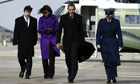 Barack Obama and his wife Michelle board Air Force One in Maryland to leave for Tucson, Arizona