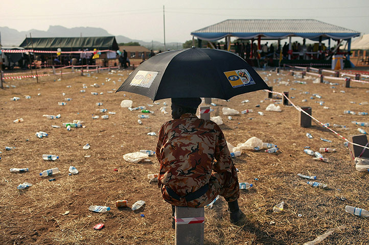 Southern Sudanisn: A south Sudanese police officer guards a polling station