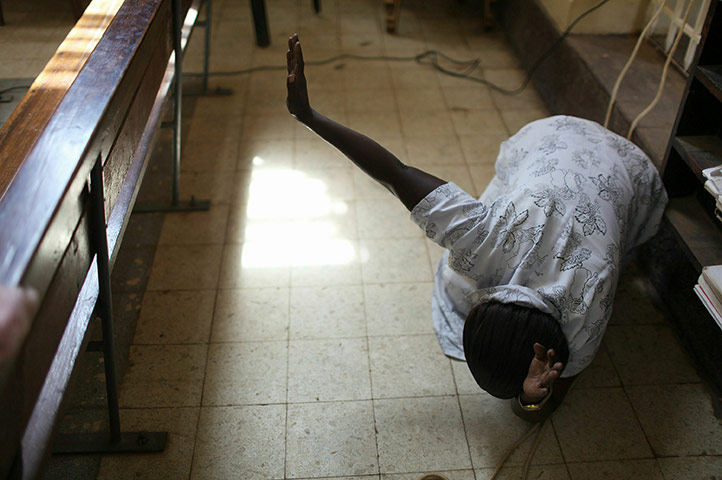 Southern Sudanisn: A southern Sudanese women participates in a day of prayer at a church