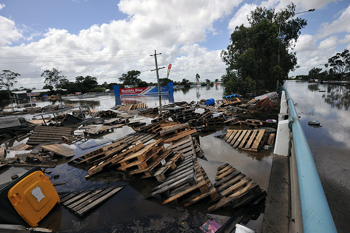 Aerials Brisbane floods: Scattered debris  from a flooded service station in the suburb of Rocklea