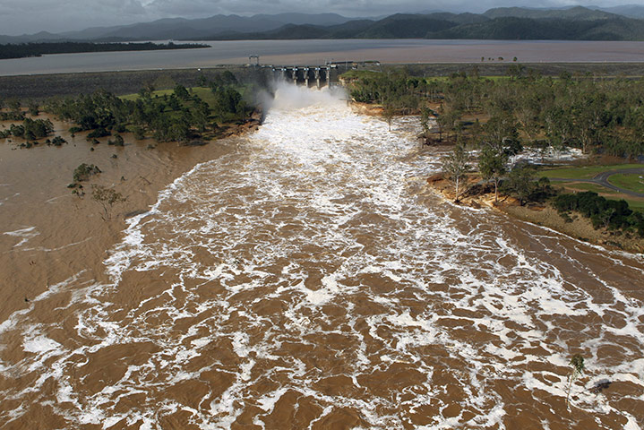 Aerials Brisbane floods: Water is released from the Wivenhoe Dam into the Brisbane river