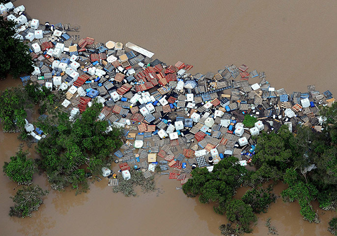 Aerials Brisbane floods: Industrial flotsam forms a logjam in the Brisbane river 