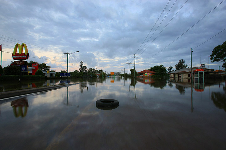 Aerials Brisbane floods: A tyre sits in the middle of a road in Rocklea