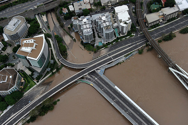 Aerials Brisbane floods: Major roads submerged by the Brisbane river