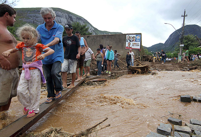 Brazil floods: People navigate the devastation caused by mudslides