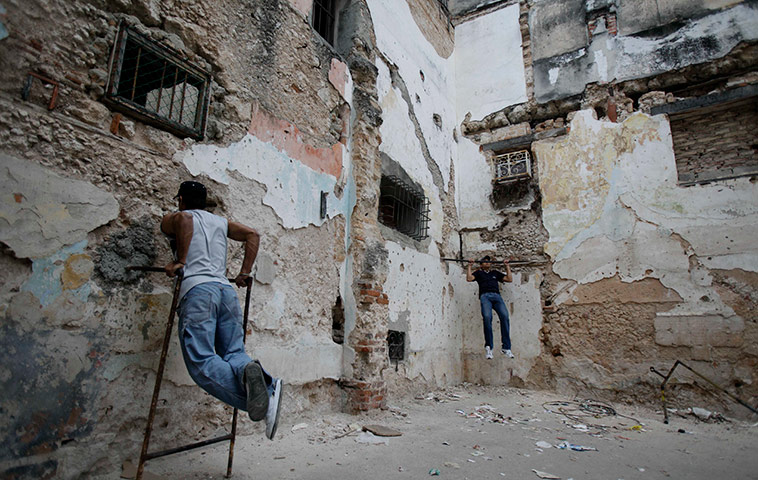24 hours in pictures: Two teenagers exercise in an improvised gym in Havana, Cuba