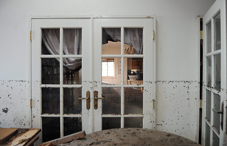 Brisbane Cleanup: The high water mark on the internal wall of a house