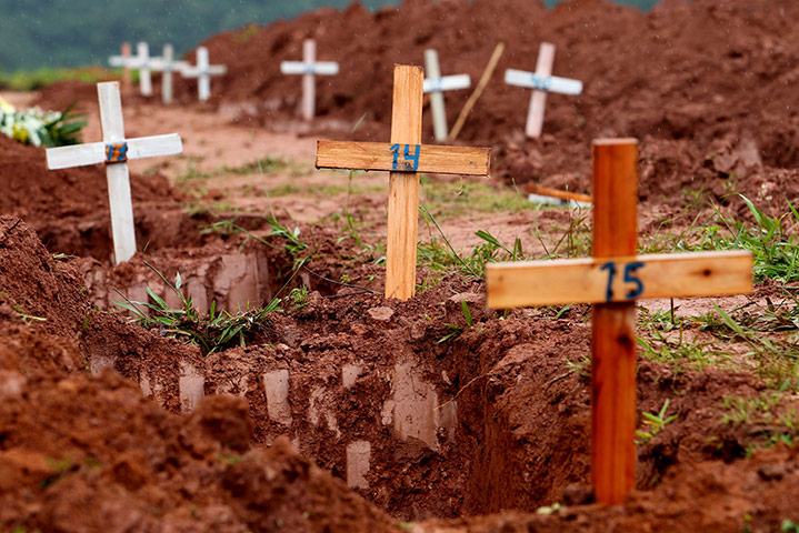 brazil mudslide aftermath: graves of victims