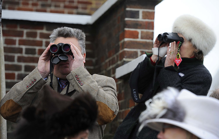King George VI: Trainer Paul Nicholls watches the 1st race
