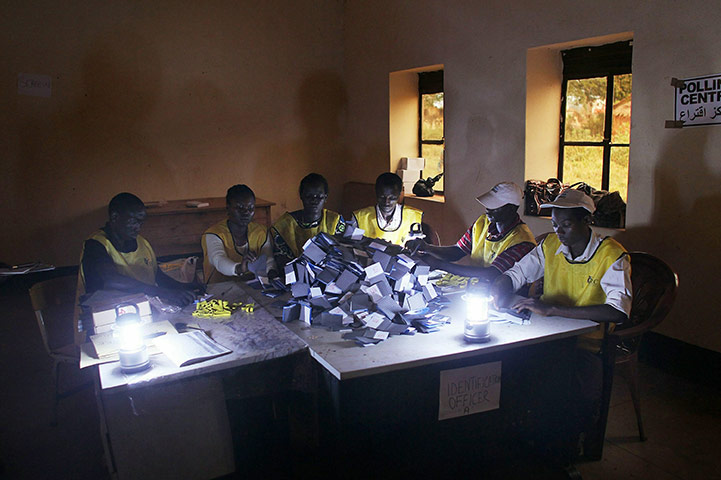 24 hours in pics:  Poll workers begin the process of counting votes Southern Sudan