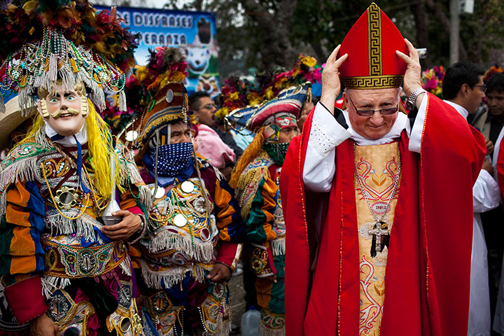24 hours in pics:  Basilica Abbot Hector Sosa Paz adjusts his hat, Esquipulas, Guatemala